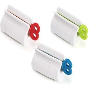Toothpaste squeezer on white background