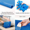 The mat laid flat on a kitchen counter with a rolling pin and flour, demonstrating easy storage