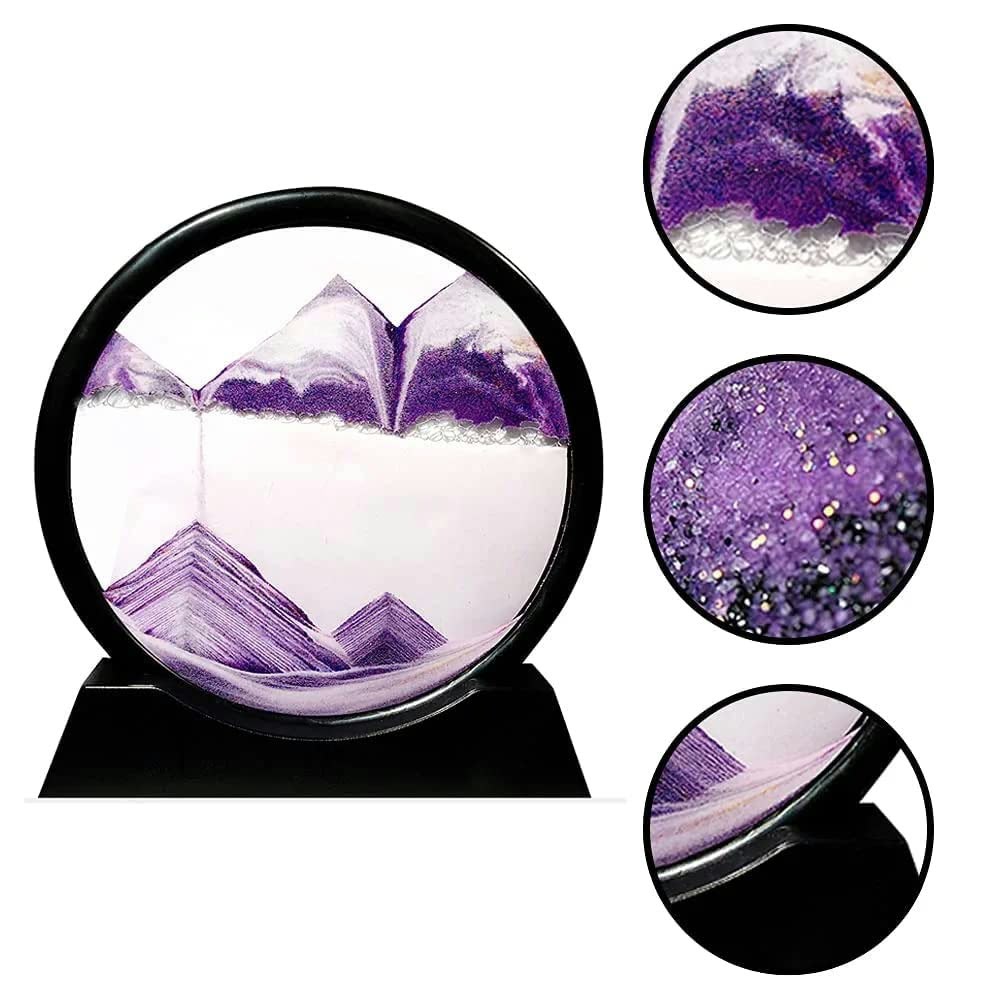Black circular kinetic sand art frame with purple mountain designs on a metal stand